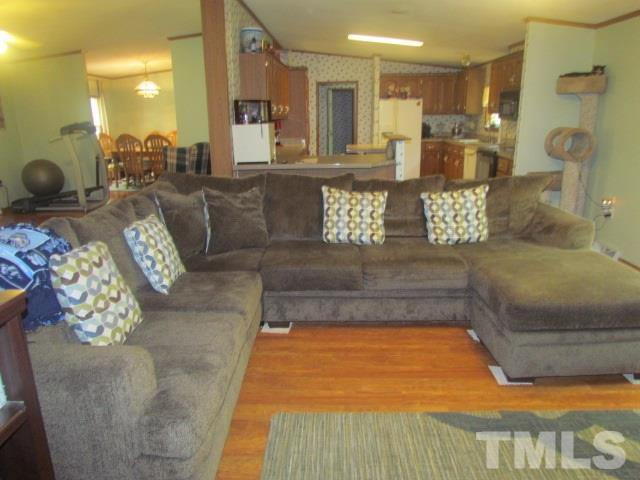109 Medlin Road Rougemont, NC 27572 - Photo 15 of 19 a living room with furniture and a couch