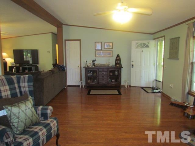 109 Medlin Road Rougemont, NC 27572 - Photo 7 of 19 a living room with furniture and a flat screen tv