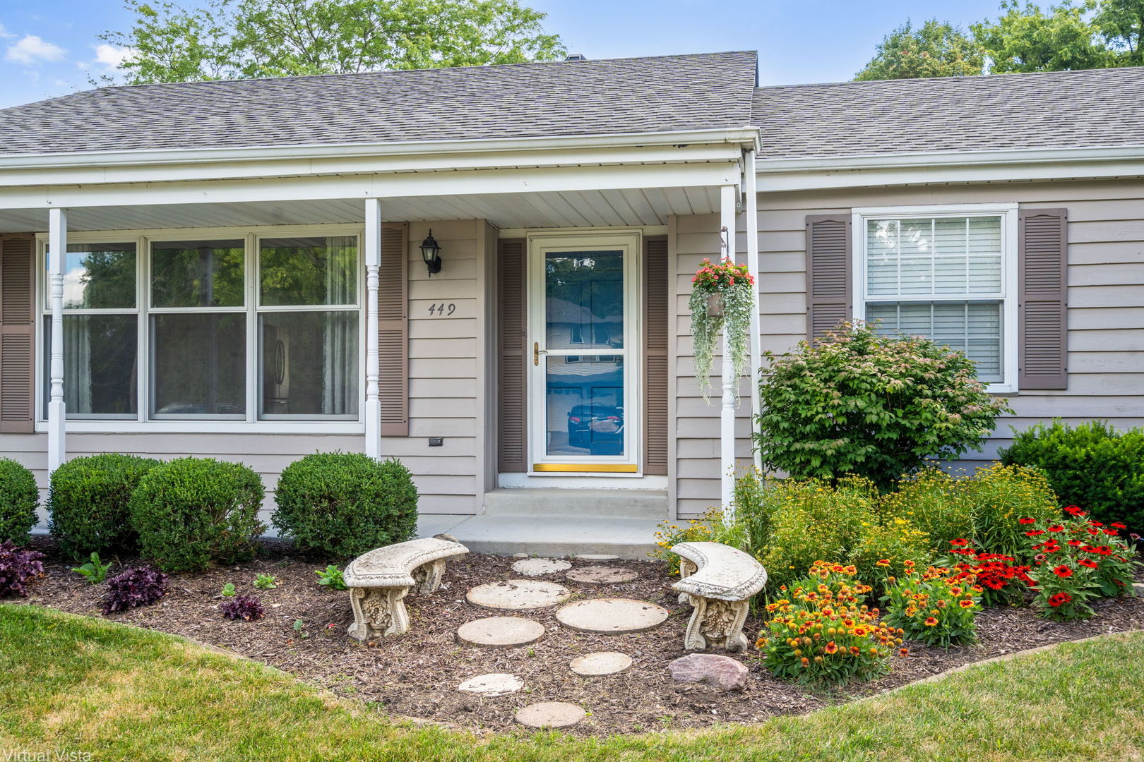 449 Ohio Road Frankfort, IL 60423 - Photo 2 of 25 a front view of a house with garden
