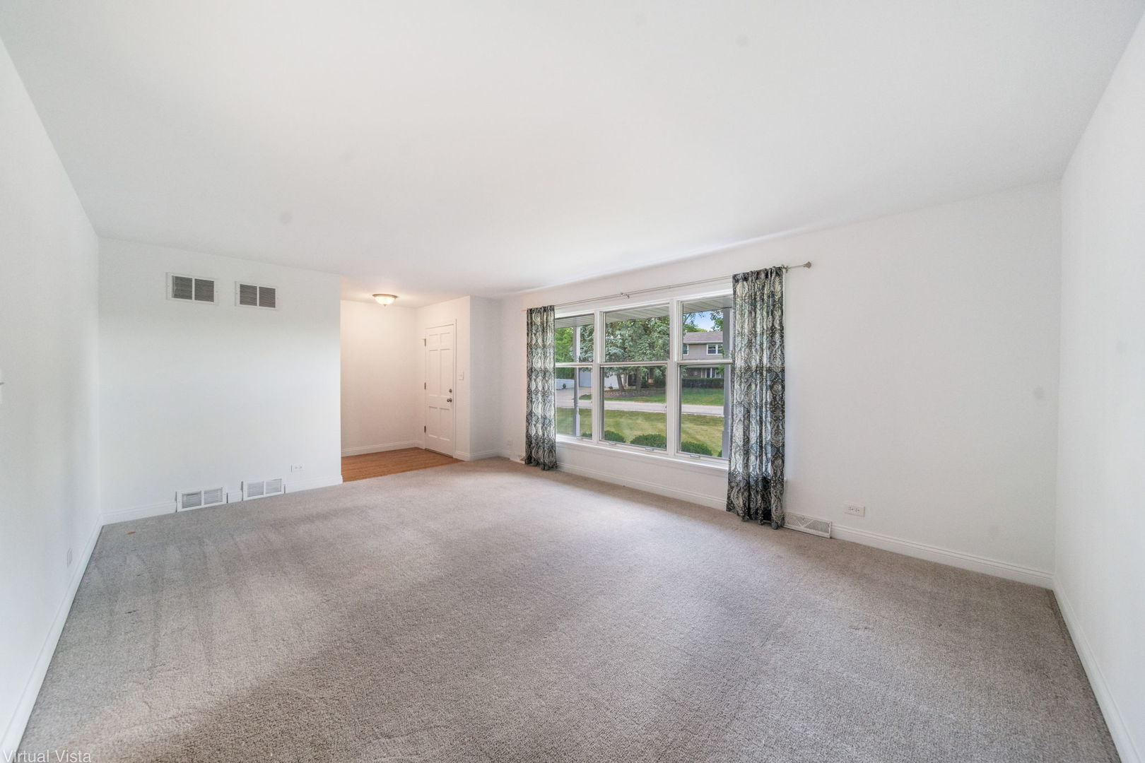 449 Ohio Road Frankfort, IL 60423 - Photo 4 of 25 a view of an empty room with a balcony