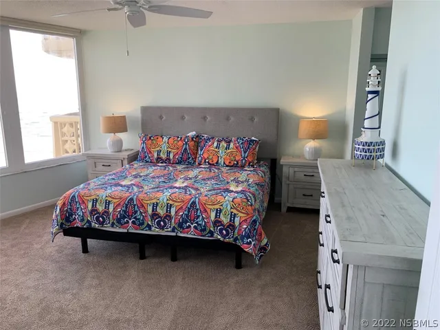 a room with a cabinets and a dresser