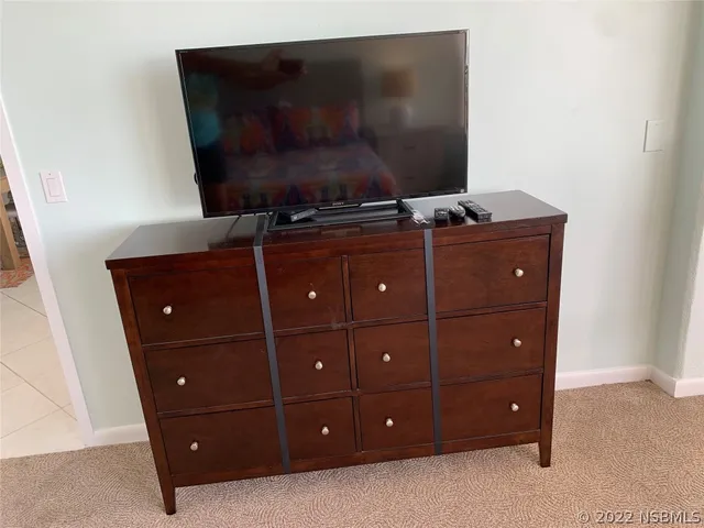 a bathroom with a shower and a toilet