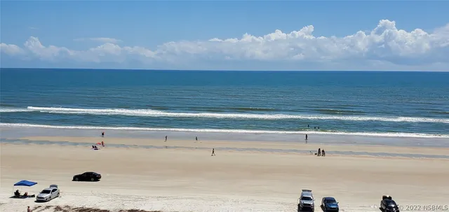 a view of beach and ocean