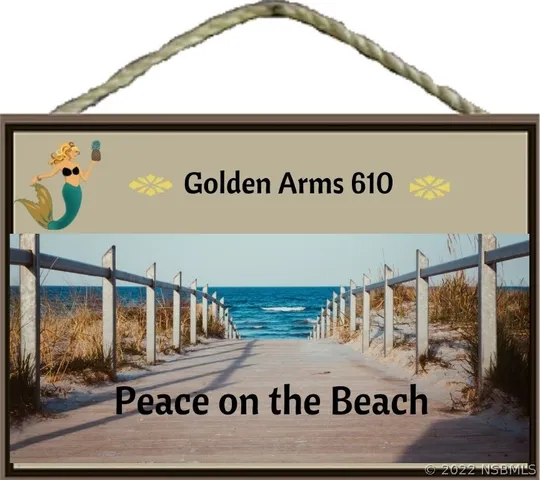 a bedroom with a bed and the view of bathroom