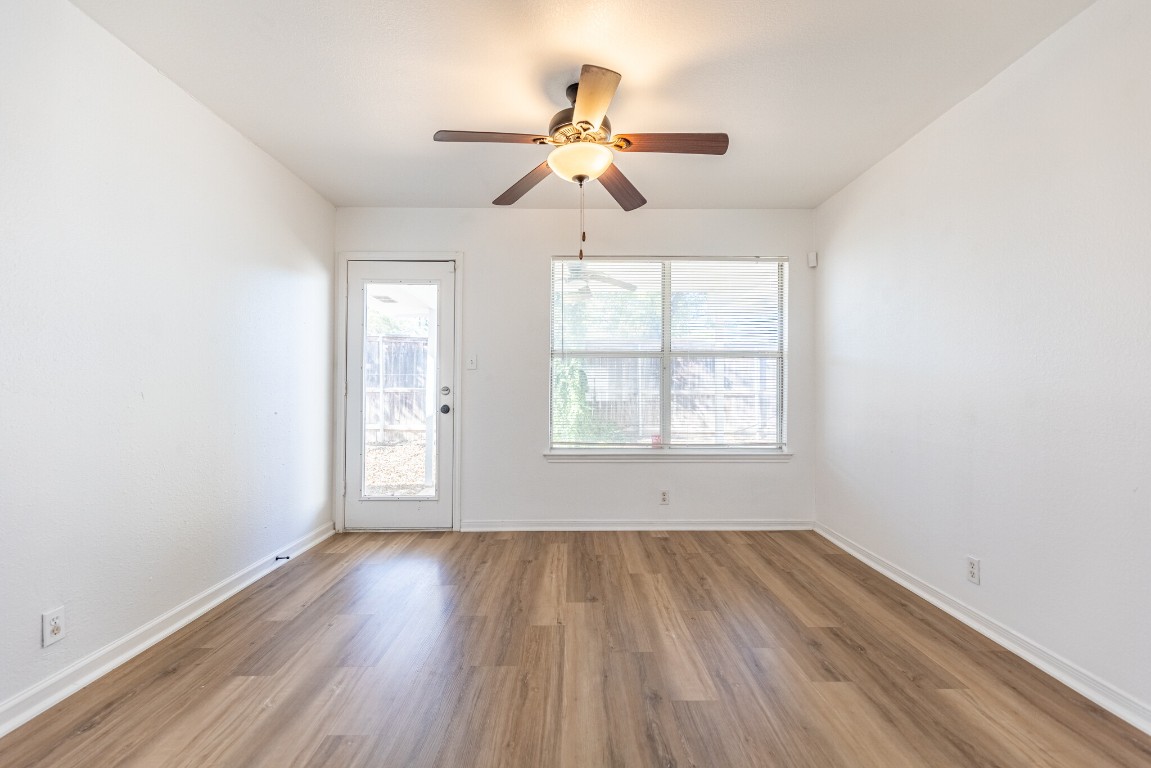 2012 Balsam Way Round Rock, TX 78665 - Photo 13 of 30 Empty room featuring wood finished floors and a ceiling fan