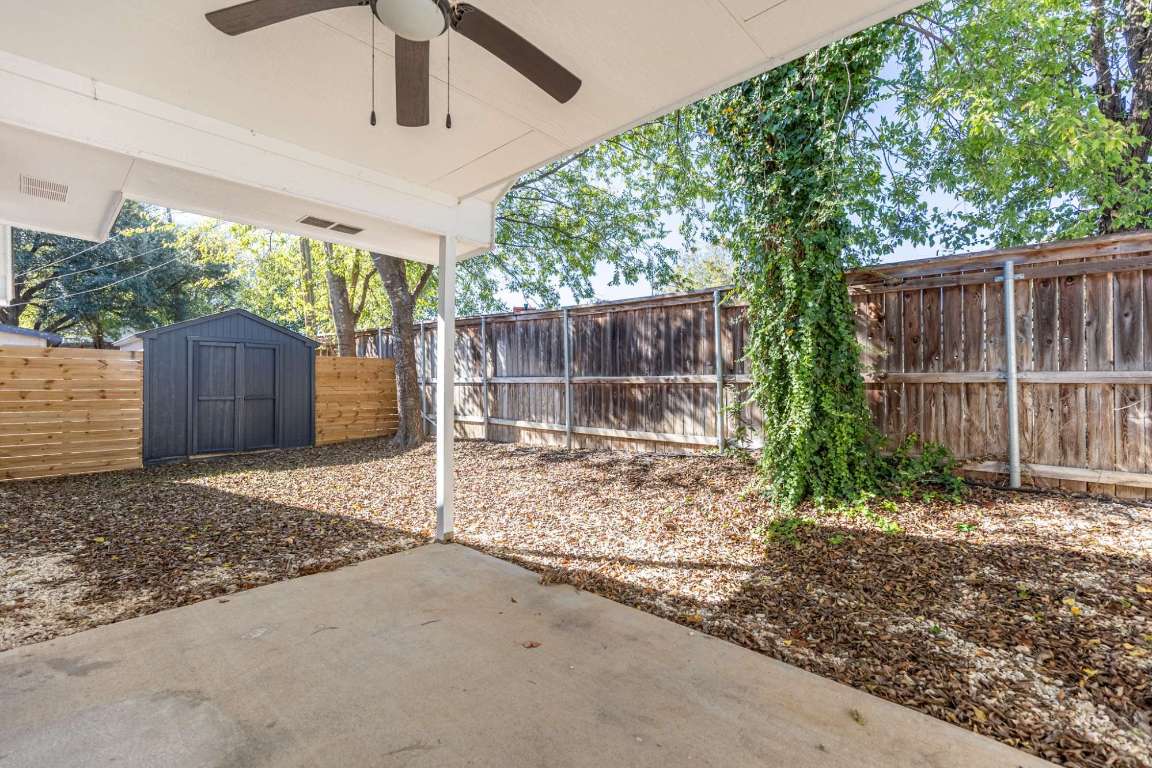 2012 Balsam Way Round Rock, TX 78665 - Photo 27 of 30 Fenced backyard featuring a shed, a patio, and ceiling fan
