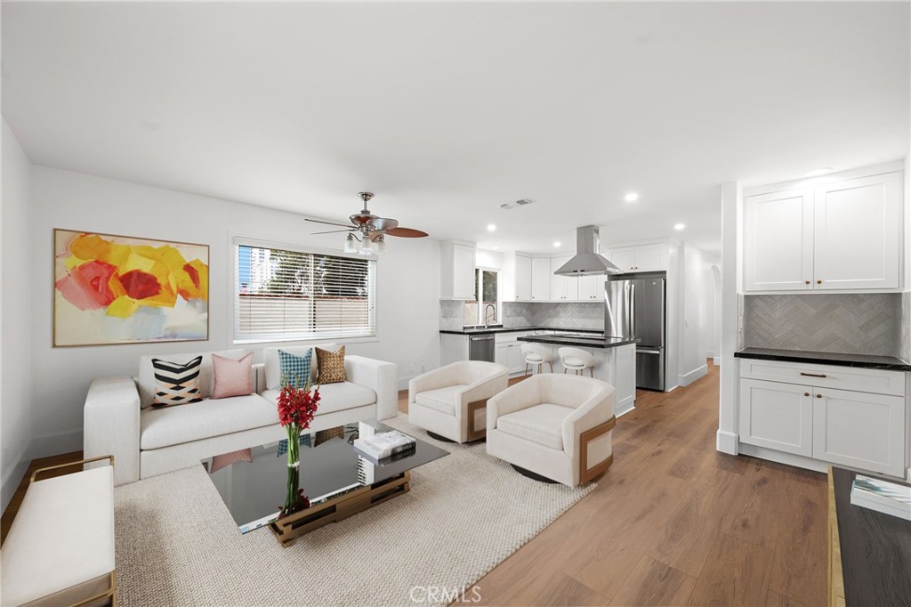 377 Roycroft Avenue Long Beach, CA 90814 - Photo 11 of 35 Open concept kitchen/family room virtually stated