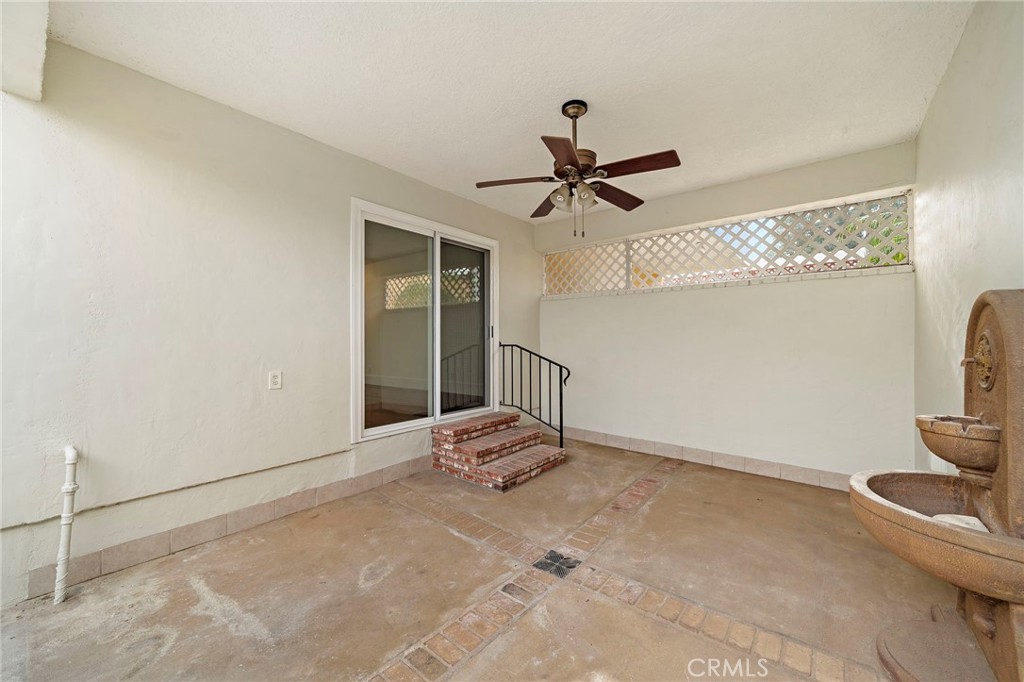 377 Roycroft Avenue Long Beach, CA 90814 - Photo 31 of 35 California room looking back at home