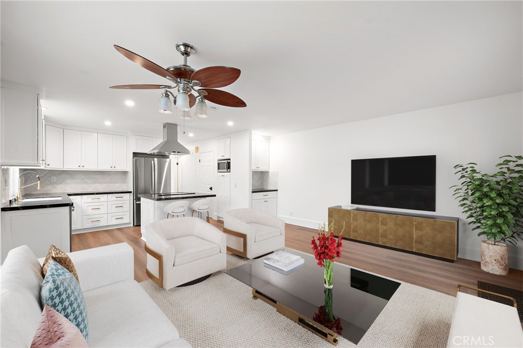 377 Roycroft Avenue Long Beach, CA 90814 - Photo 10 of 35 Open concept kitchen/family room -virtually staged