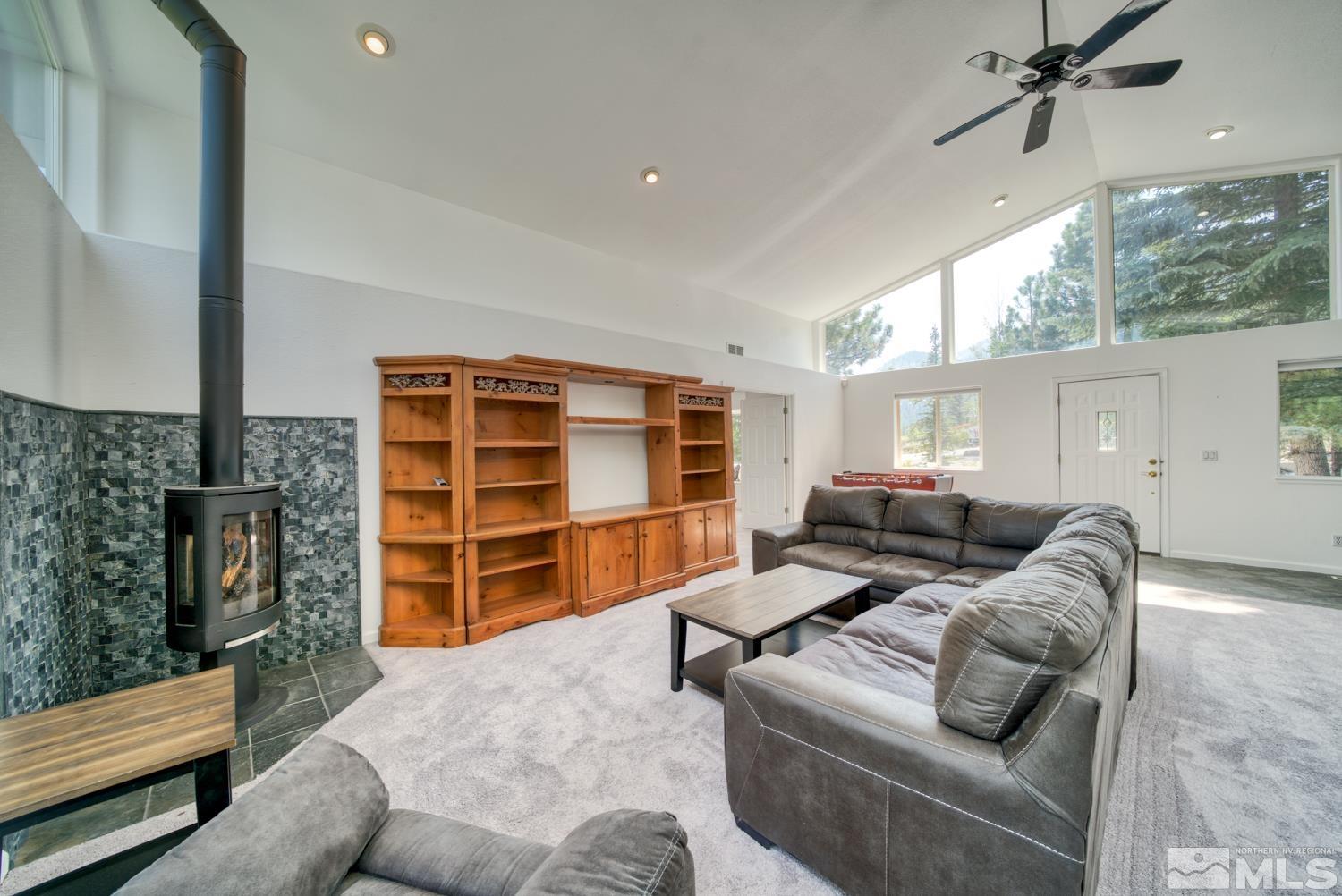 50 Sunridge Drive Reno, NV 89511 - Photo 4 of 30 a living room with furniture and a large window