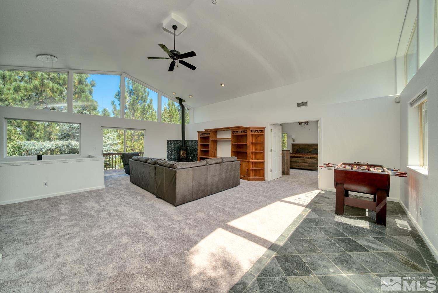 50 Sunridge Drive Reno, NV 89511 - Photo 5 of 30 a living room with furniture and a large window