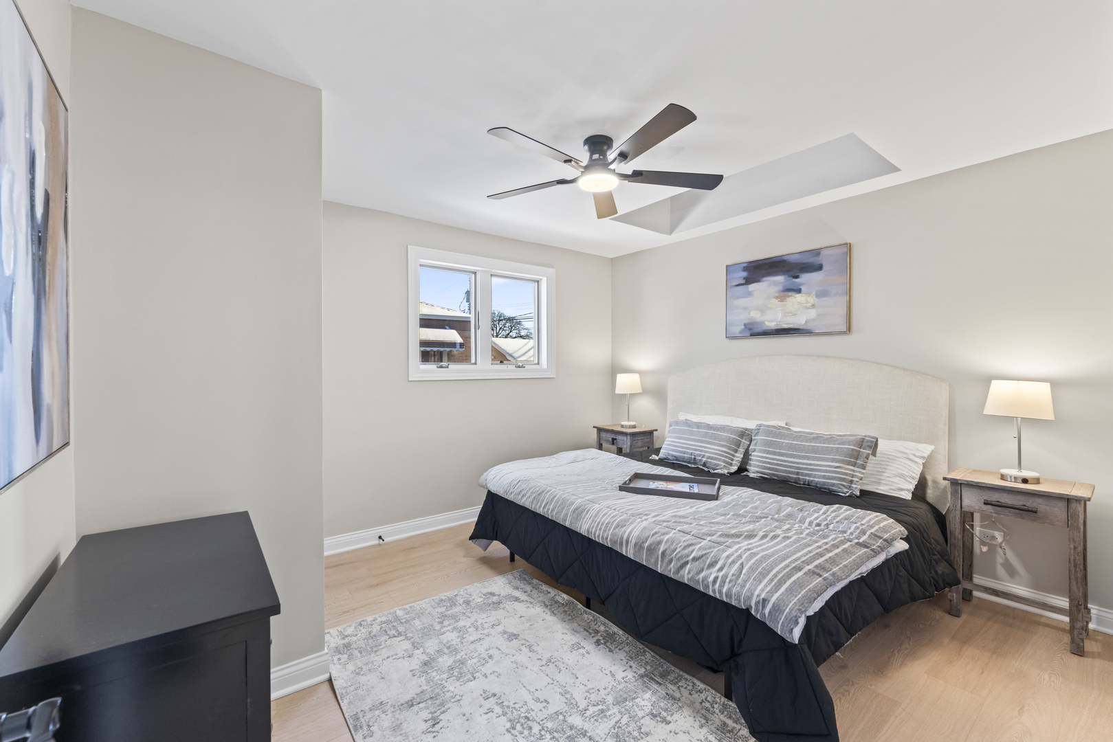 8169 South Tripp Avenue Chicago, IL 60652 - Photo 16 of 31 a bedroom with a large bed and a window