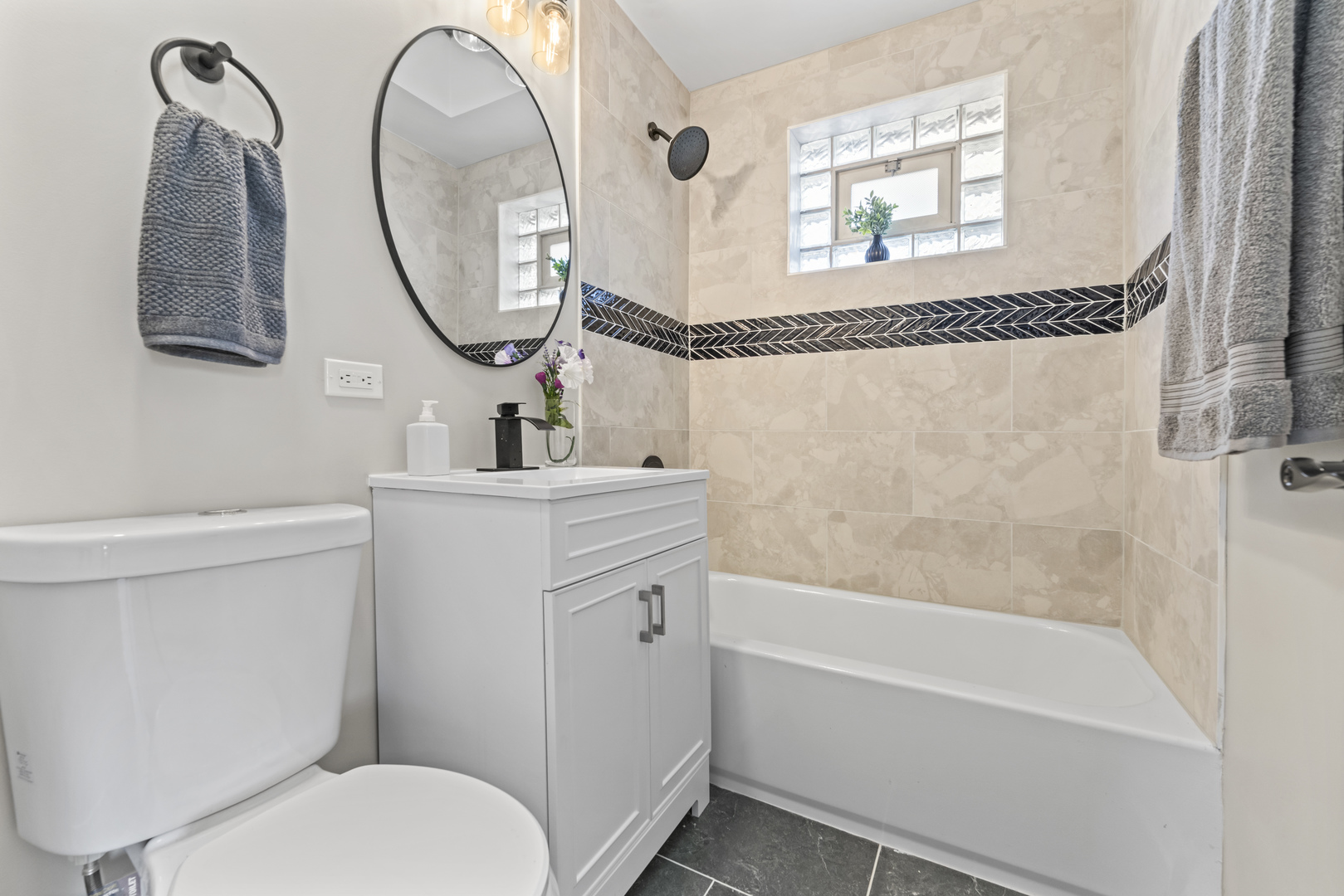 8169 South Tripp Avenue Chicago, IL 60652 - Photo 19 of 31 a bathroom with a sink toilet and a mirror