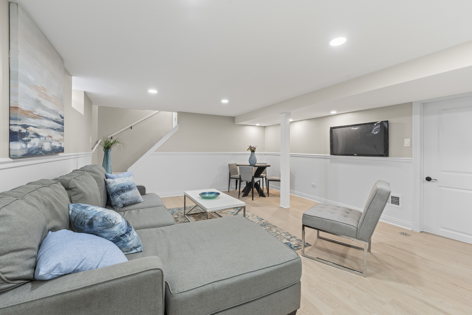 8169 South Tripp Avenue Chicago, IL 60652 - Photo 23 of 31 a living room with furniture and a flat screen tv