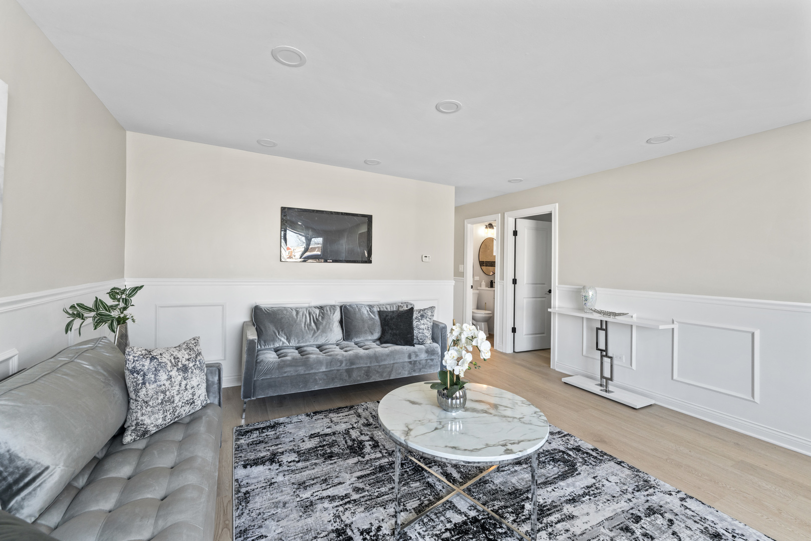8169 South Tripp Avenue Chicago, IL 60652 - Photo 9 of 31 a living room with furniture and a rug
