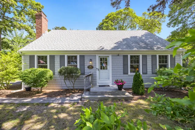 a house view with a garden space