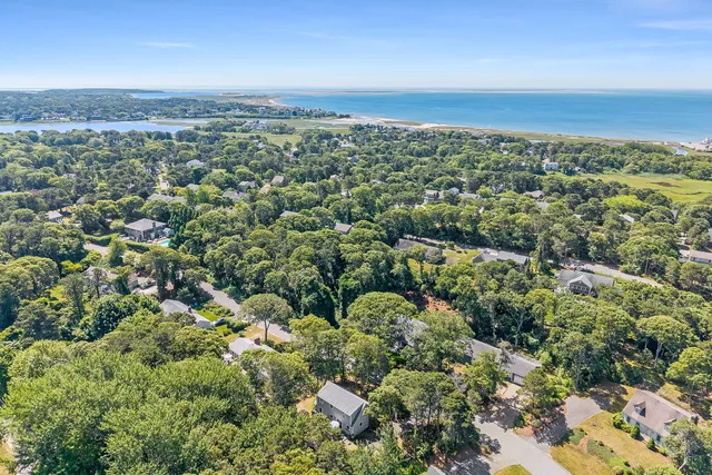 an aerial view of a city with lots of residential buildings