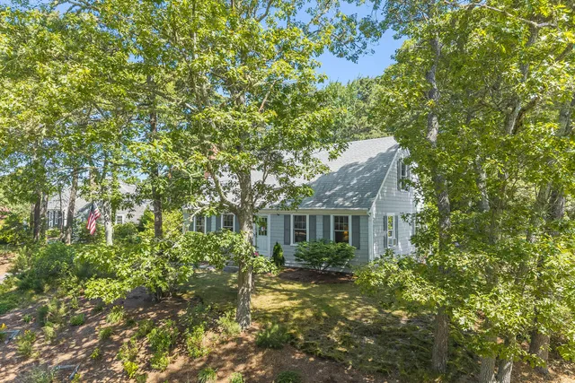 a picture of a room with a white wall and picture of white wall