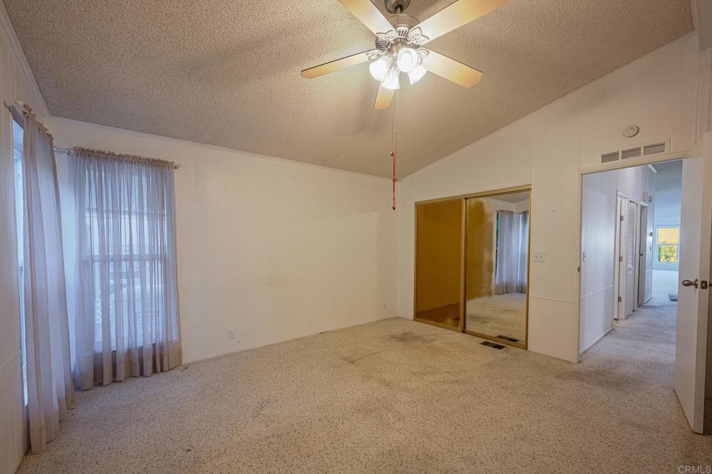 4650 Dulin Road, Unit 175 Fallbrook, CA 92003 - Photo 12 of 53 wooden floor in an empty room