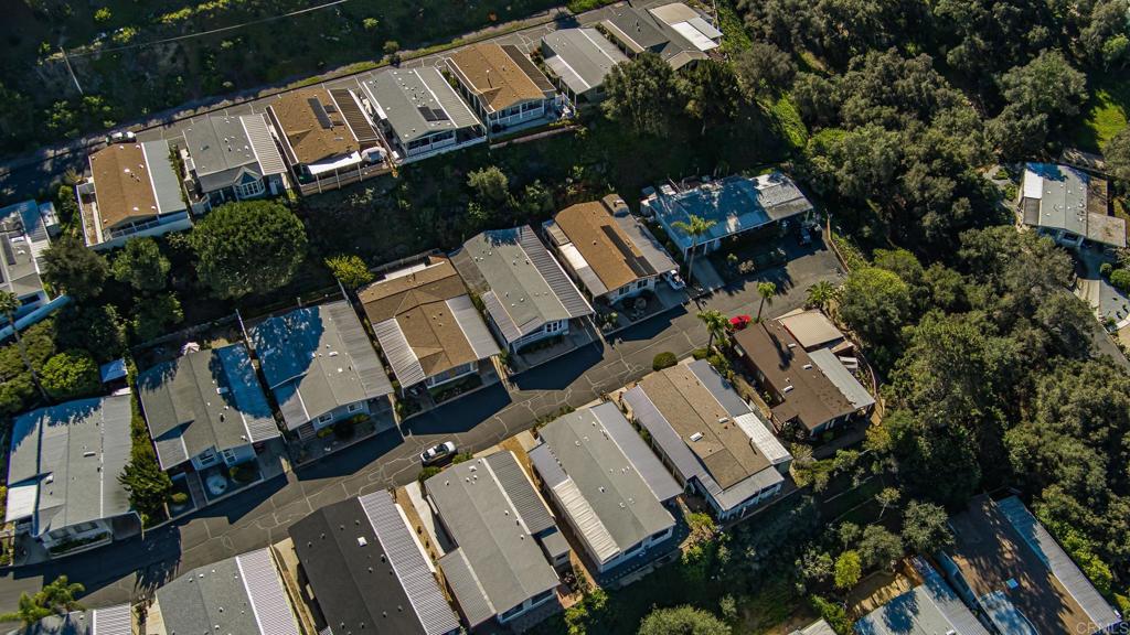 4650 Dulin Road, Unit 175 Fallbrook, CA 92003 - Photo 32 of 53 an aerial view of multiple houses with yard