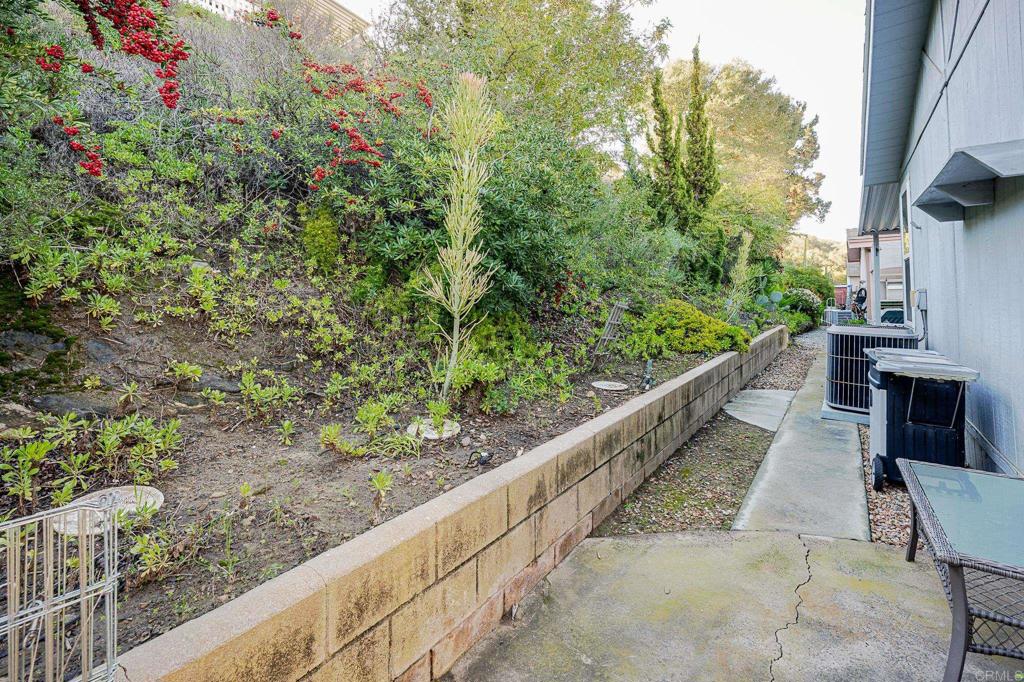 4650 Dulin Road, Unit 175 Fallbrook, CA 92003 - Photo 37 of 53 a view of a balcony with wooden floor and fence