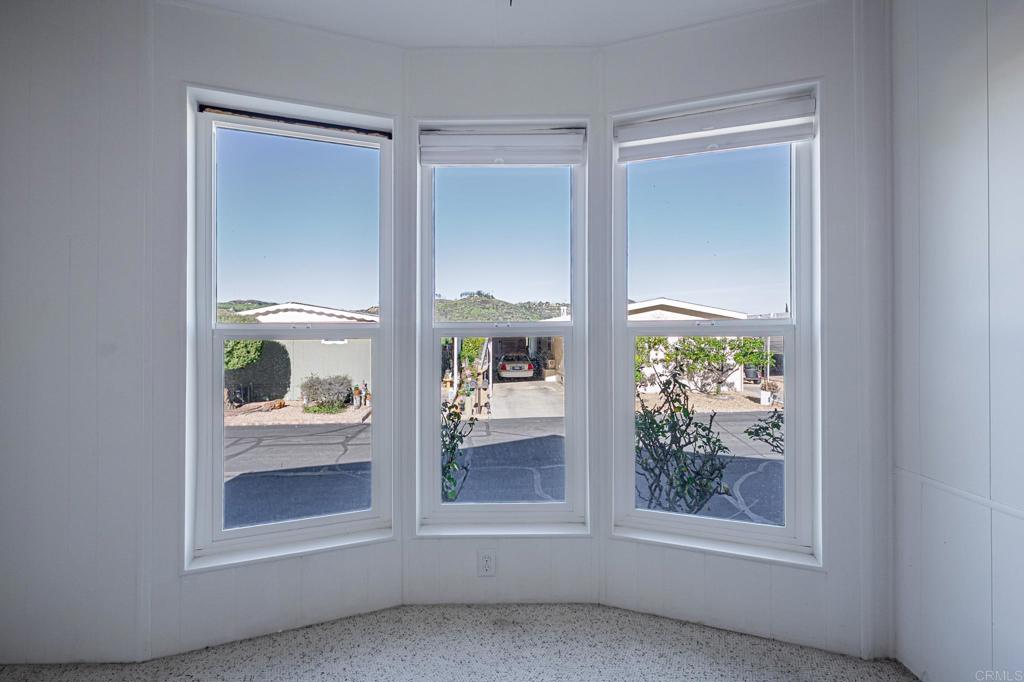 4650 Dulin Road, Unit 175 Fallbrook, CA 92003 - Photo 4 of 53 a view of an empty room and window