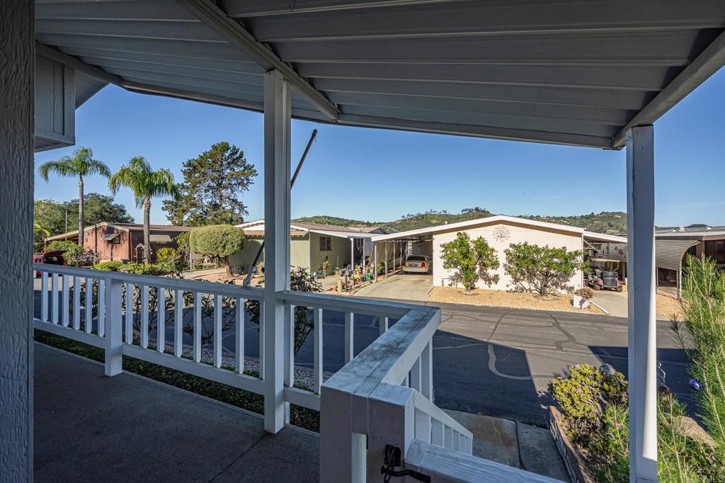 4650 Dulin Road, Unit 175 Fallbrook, CA 92003 - Photo 43 of 53 a view of balcony with wooden floor