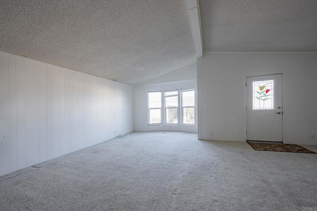 4650 Dulin Road, Unit 175 Fallbrook, CA 92003 - Photo 44 of 53 an empty room with windows