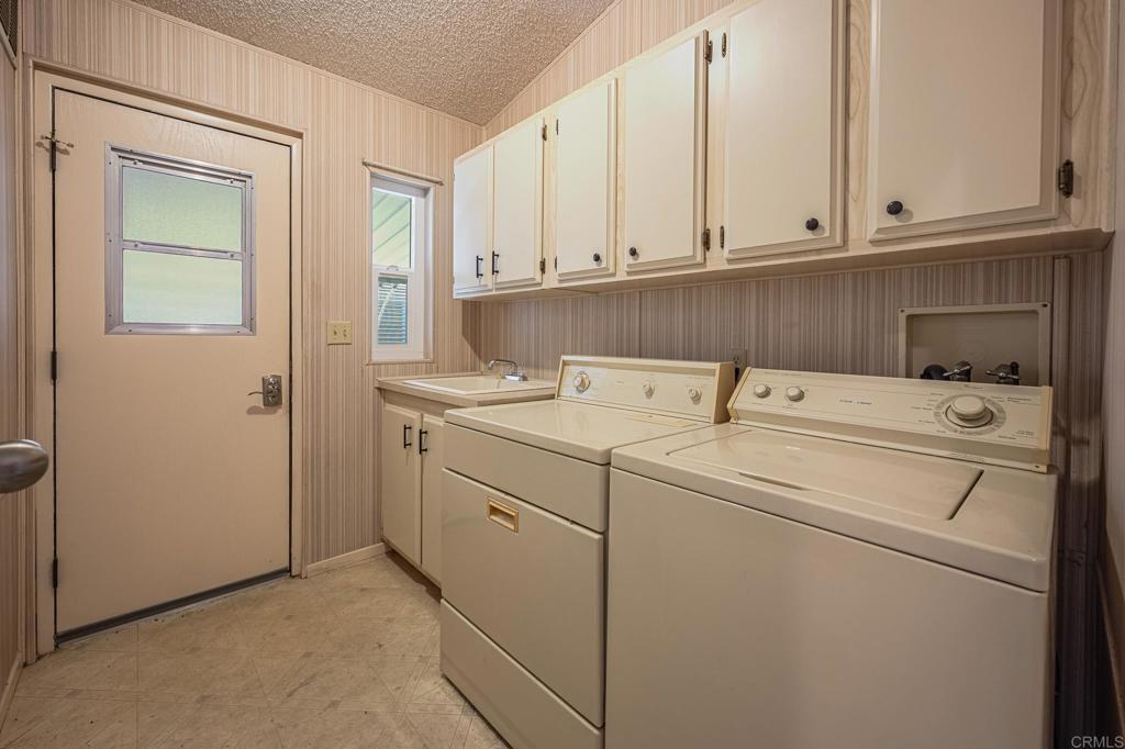 4650 Dulin Road, Unit 175 Fallbrook, CA 92003 - Photo 47 of 53 a utility room with dryer and washer