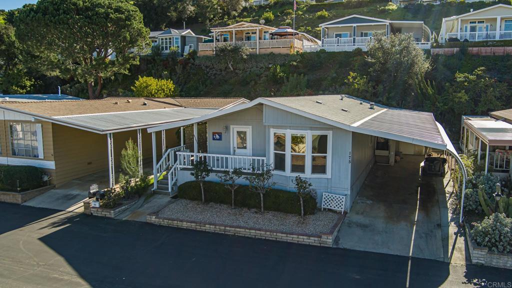 4650 Dulin Road, Unit 175 Fallbrook, CA 92003 - Photo 53 of 53 an aerial view of a house with yard and sitting area