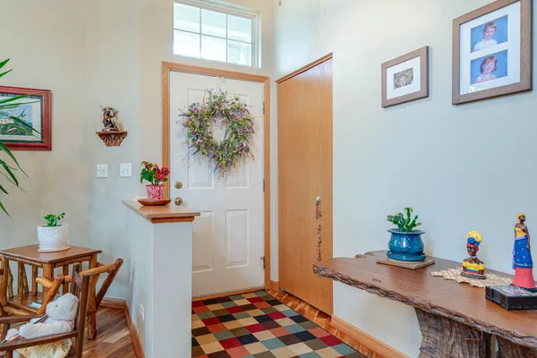 a dining room with a table and chairs