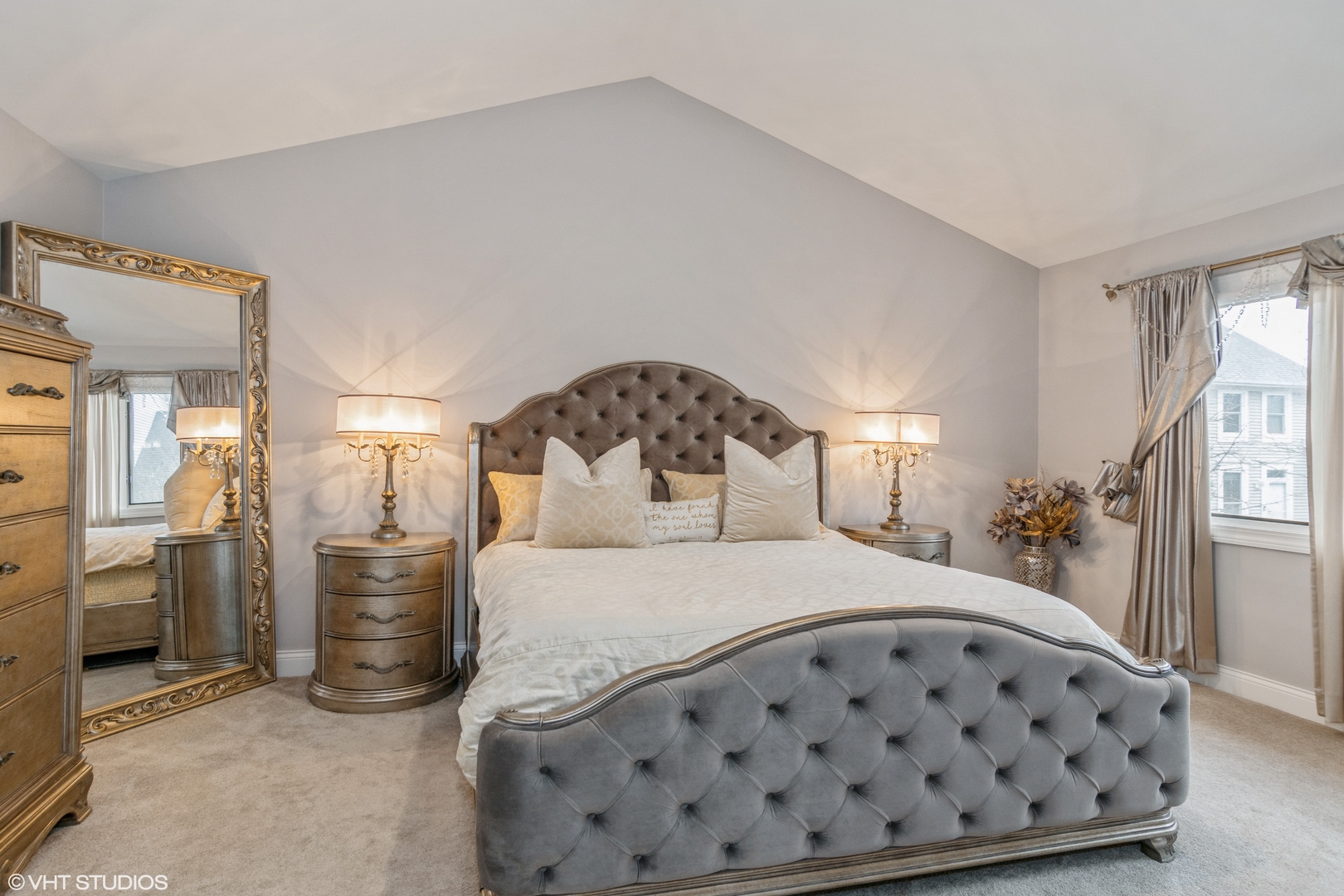 288 Windsor Drive Bartlett, IL 60103 - Photo 14 of 24 a bedroom with a large bed and a dresser