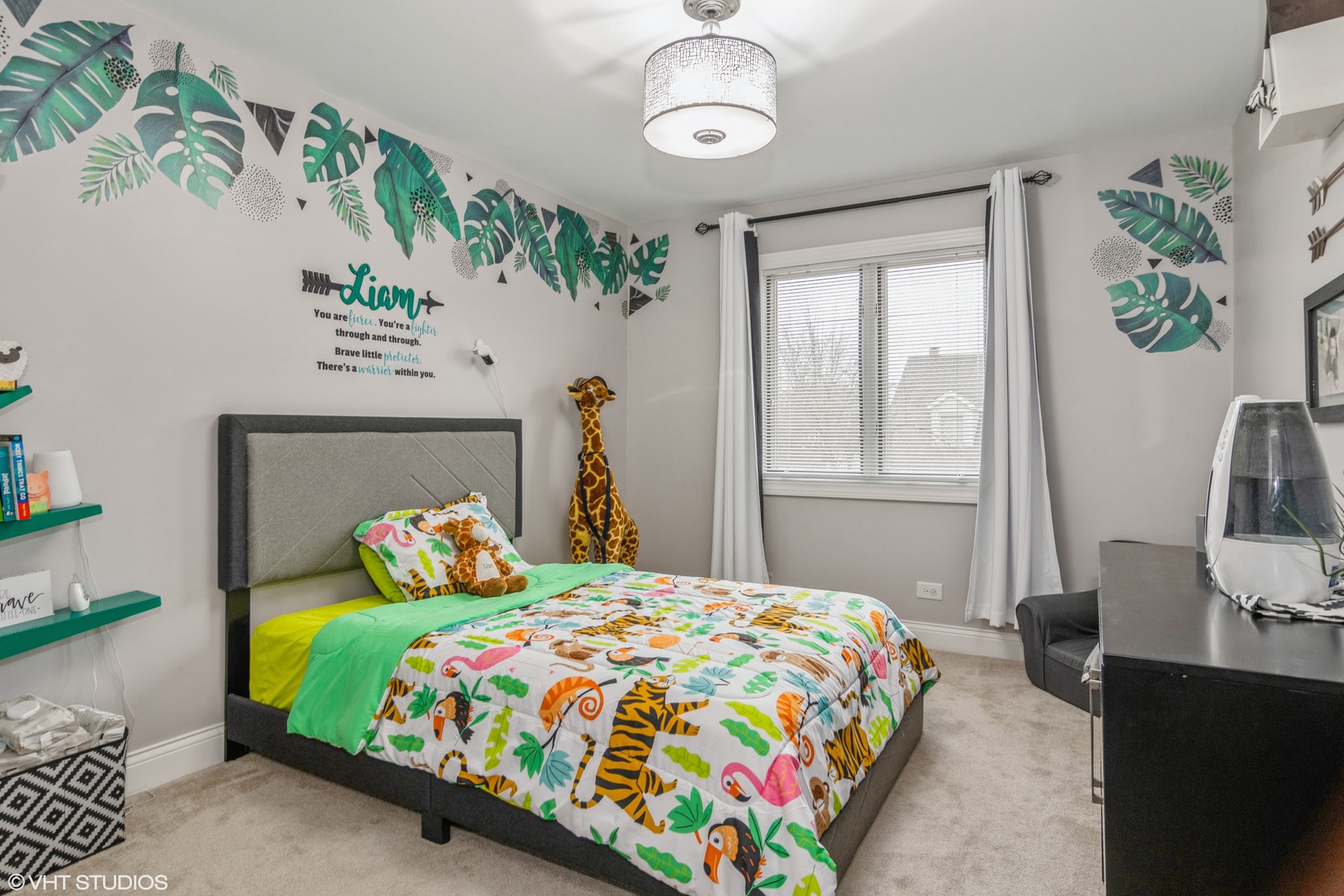 288 Windsor Drive Bartlett, IL 60103 - Photo 17 of 24 a bedroom with a bed table and window