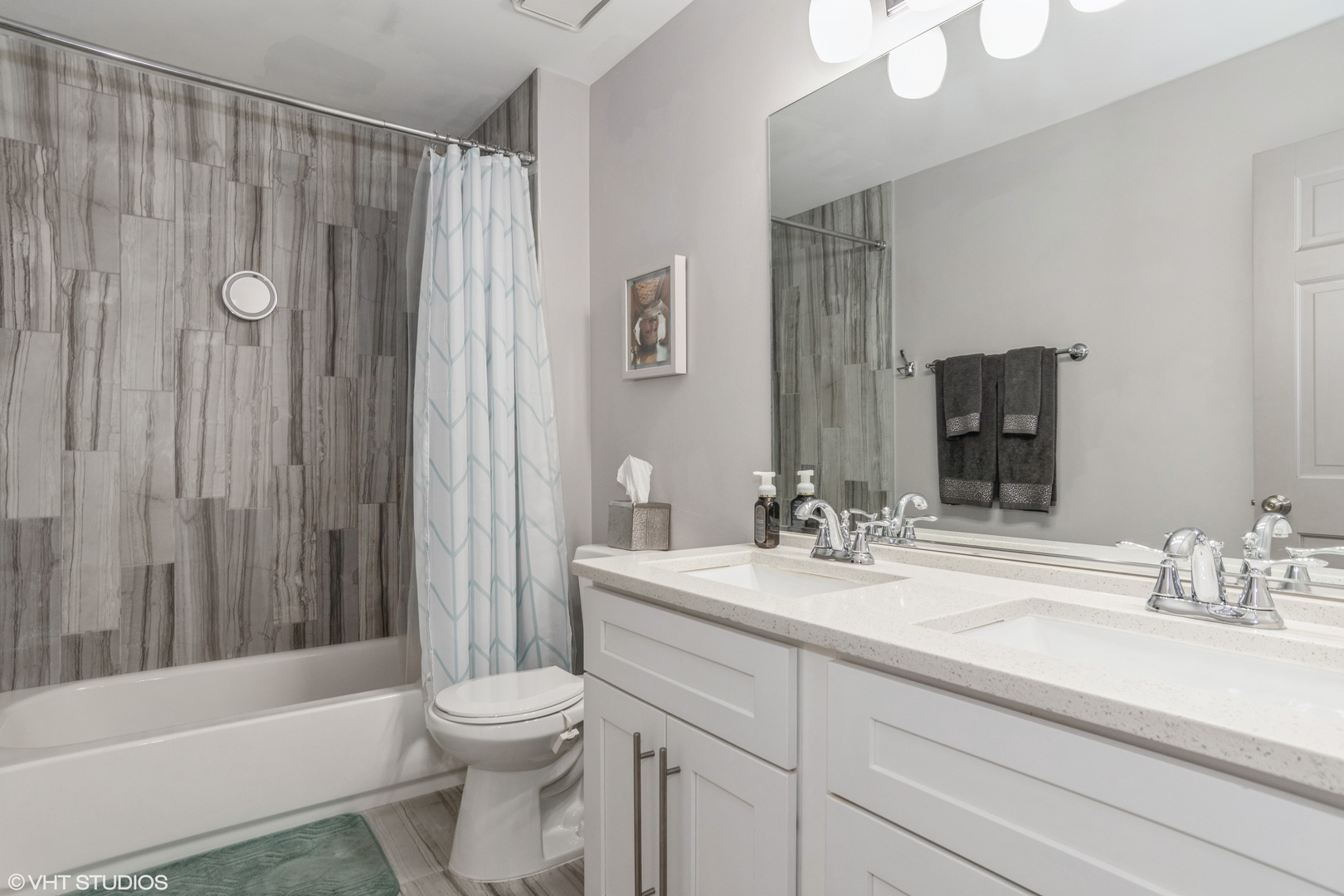 288 Windsor Drive Bartlett, IL 60103 - Photo 19 of 24 a bathroom with a sink a toilet and shower