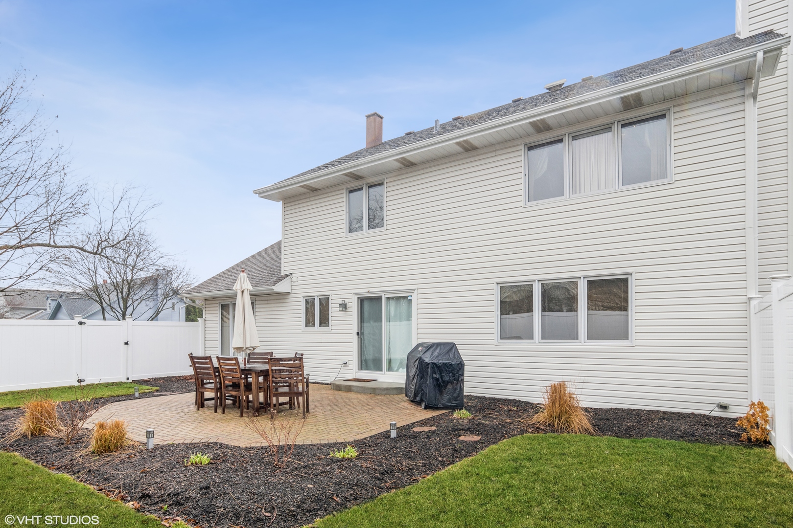 288 Windsor Drive Bartlett, IL 60103 - Photo 23 of 24 a view of a house with patio