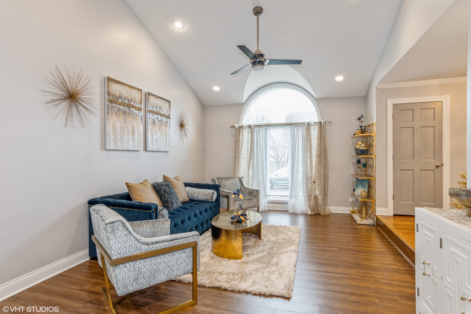 288 Windsor Drive Bartlett, IL 60103 - Photo 4 of 24 a living room with furniture and a wooden floor