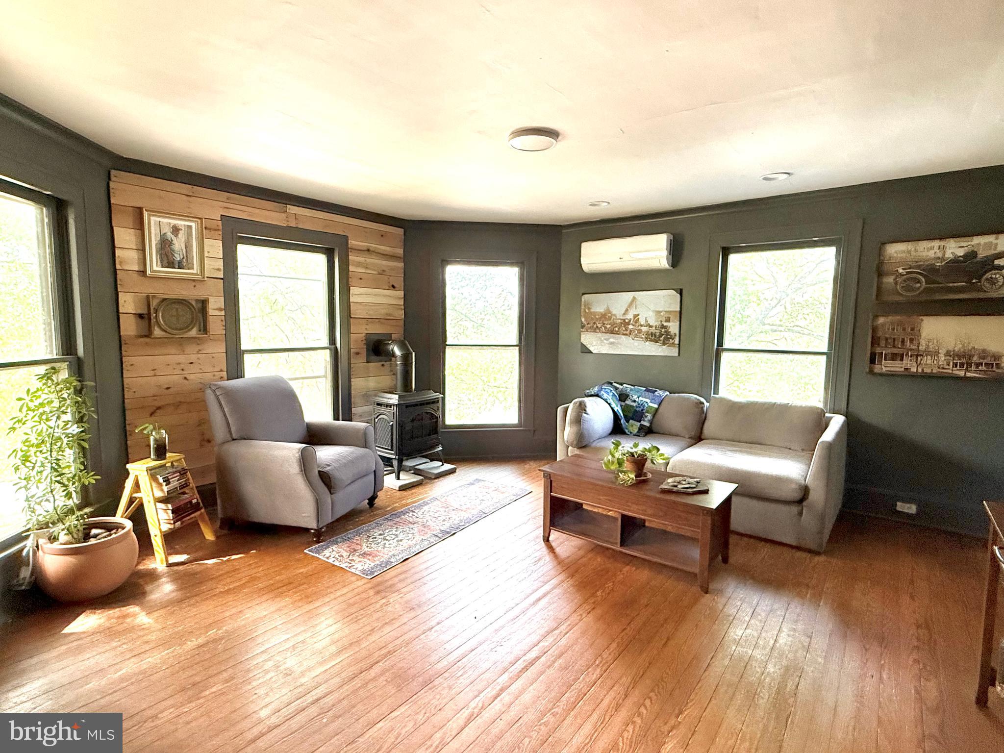 4 South 1st Street Denton, MD 21629 - Photo 78 of 123 a living room with furniture and a large window