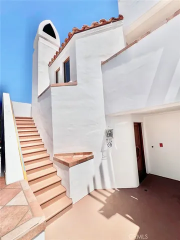 a view of a hallway with entryway