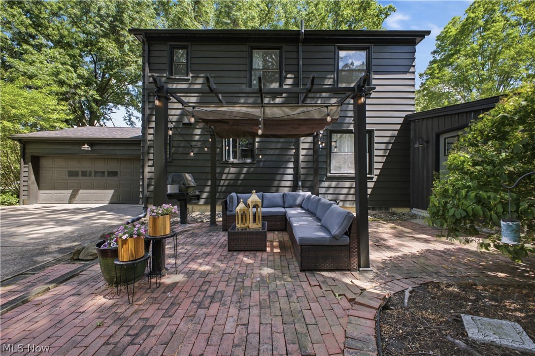 2411 Ridgeview Lane Youngstown, OH 44514 - Photo 33 of 48 Brick paver patio featuring a pergola structure