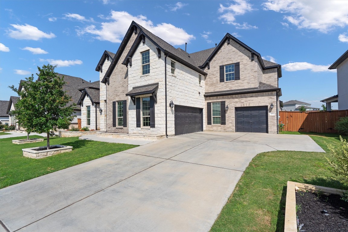 4916 Risana Bend Round Rock, TX 78665 - Photo 1 of 1 a front view of a house with a yard