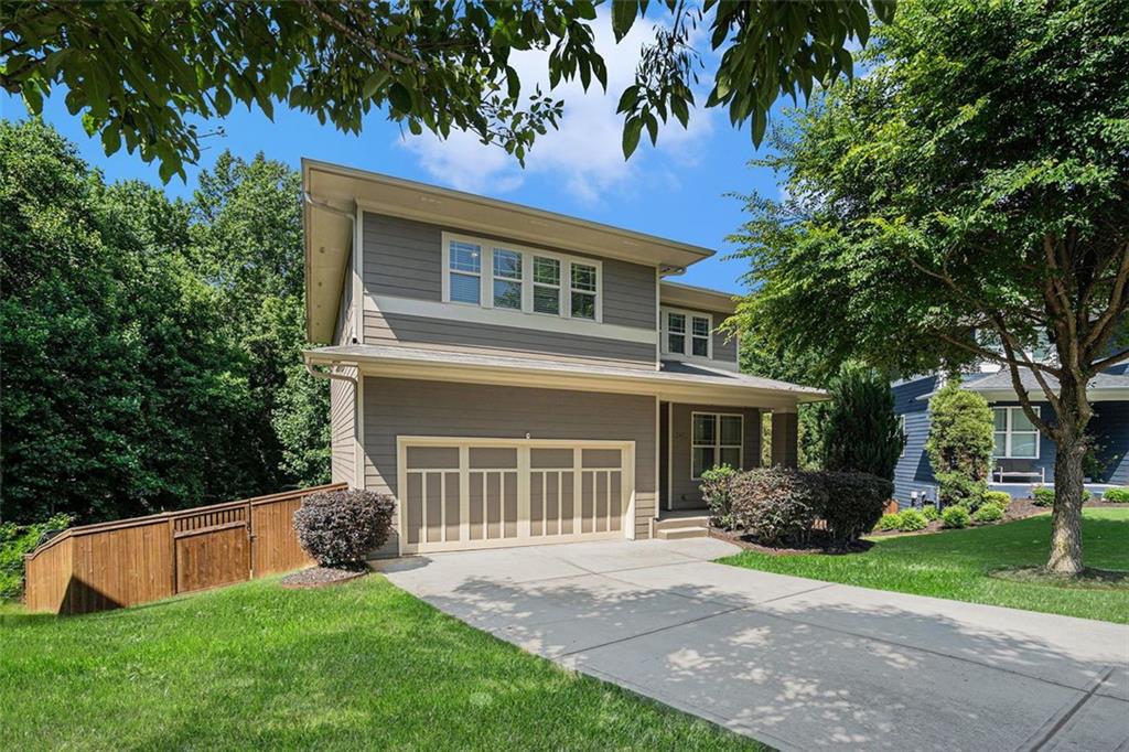 2452 Boulder Road Southeast Atlanta, GA 30316 - Photo 1 of 1 a view of a house with a yard and a large tree