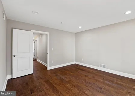 a view of entryway with wooden floor
