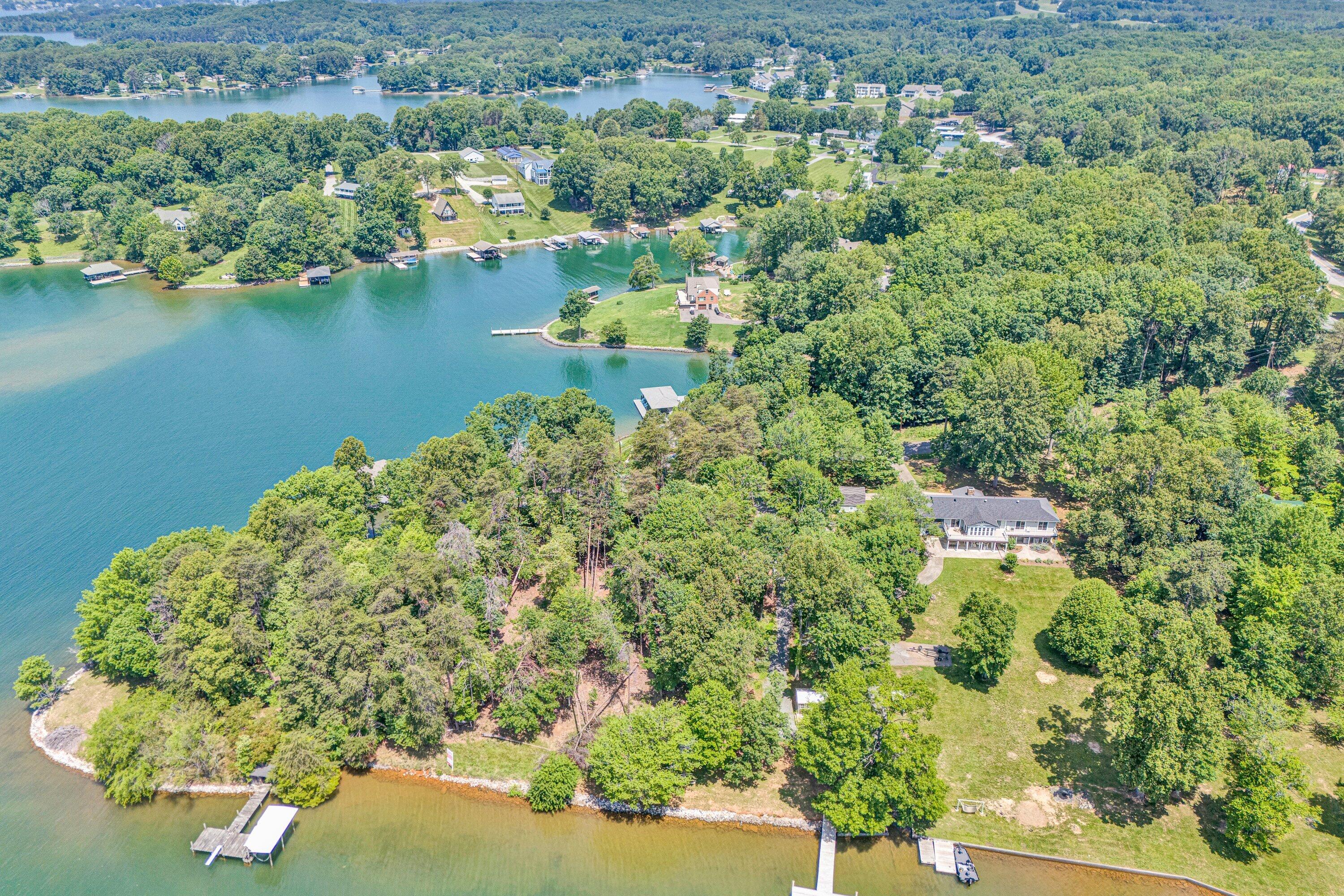 Lot 3 Sigh N Pine Road Huddleston, VA 24104 - Photo 17 of 23 an aerial view of residential houses with outdoor space and trees