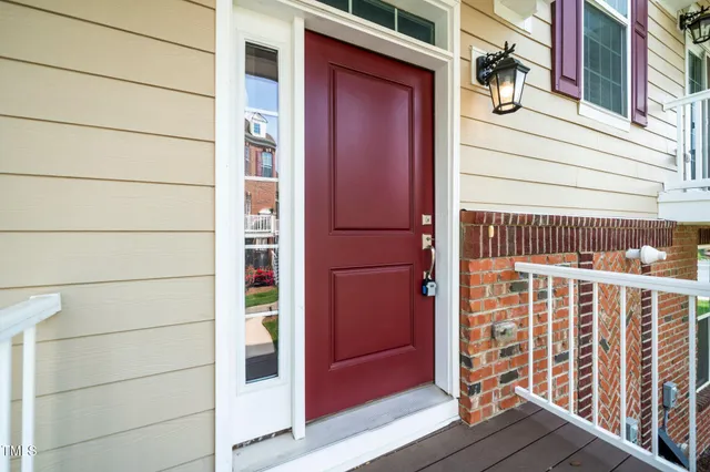 a view of porch with wooden floor