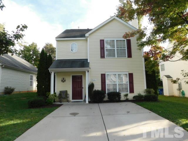 924 Roxy Street Raleigh, NC 27610 - Photo 1 of 15 a front view of a house with yard and parking