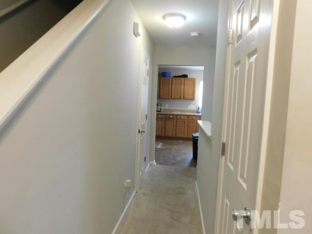 924 Roxy Street Raleigh, NC 27610 - Photo 7 of 15 a bathroom with a sink and a mirror