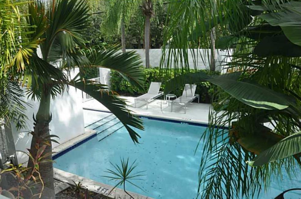 3258 Virginia Street, Unit A4 Miami, FL 33133 - Photo 3 of 20 a view of an outdoor space and seating area