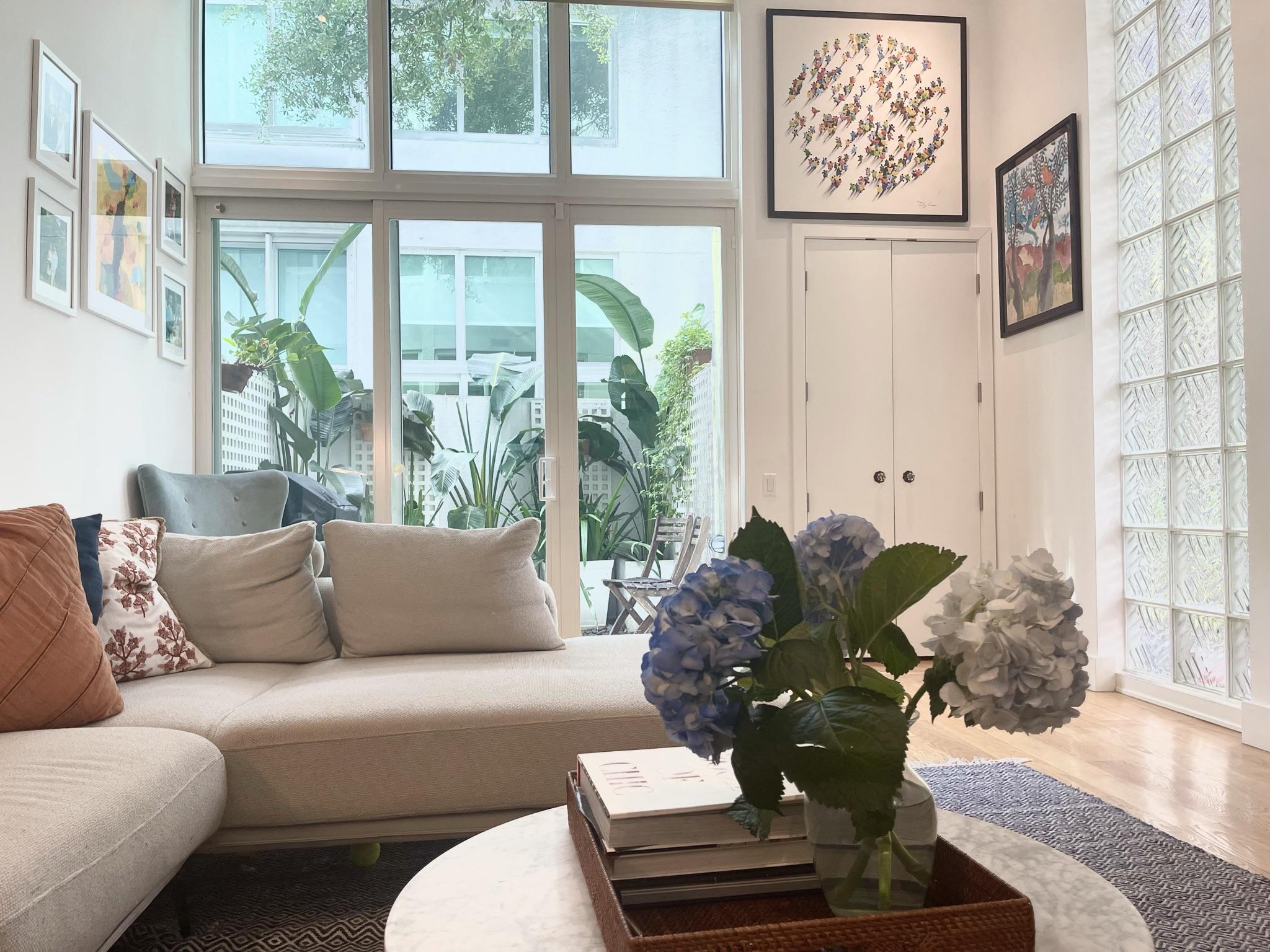 3258 Virginia Street, Unit A4 Miami, FL 33133 - Photo 5 of 20 a living room with furniture and a large window