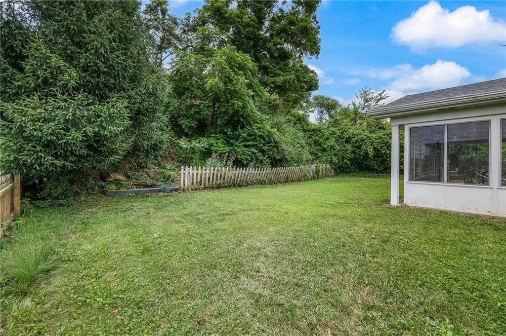 1654 Hollyrood Road Pittsburgh, PA 15227 - Photo 33 of 33 a view of a backyard with large trees