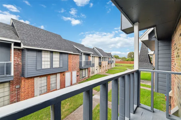 a balcony view with city view